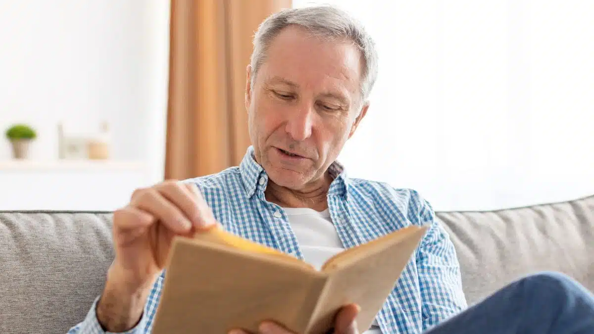 senior man reading a book