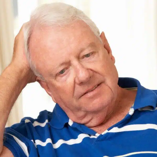 senior man sitting on the couch