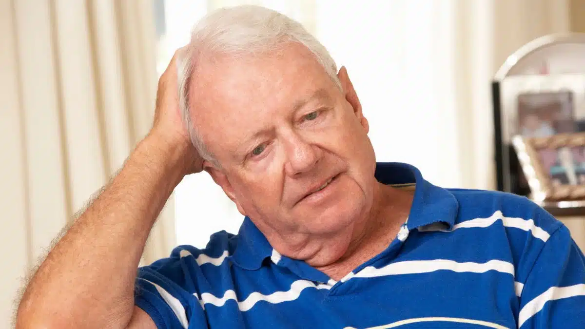 senior man sitting on the couch