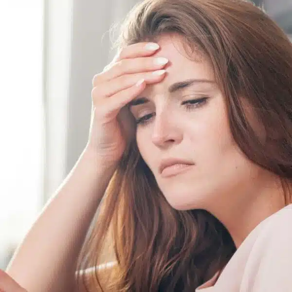woman alone thinking at home