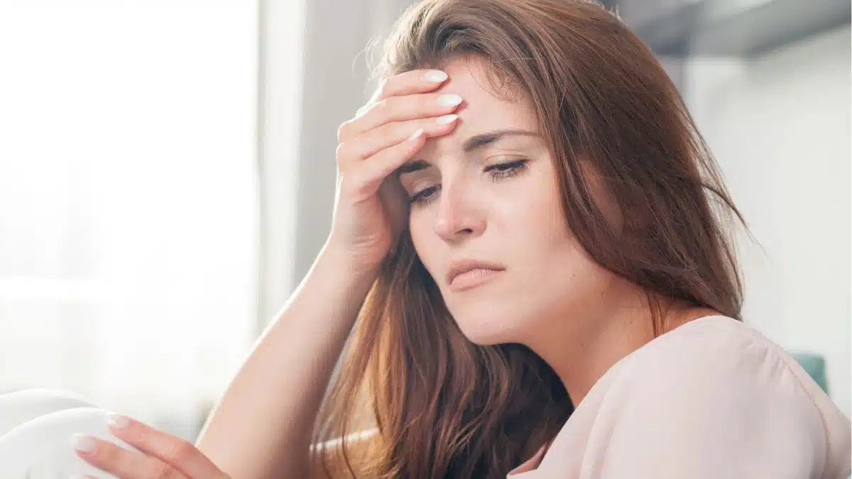 woman alone thinking at home
