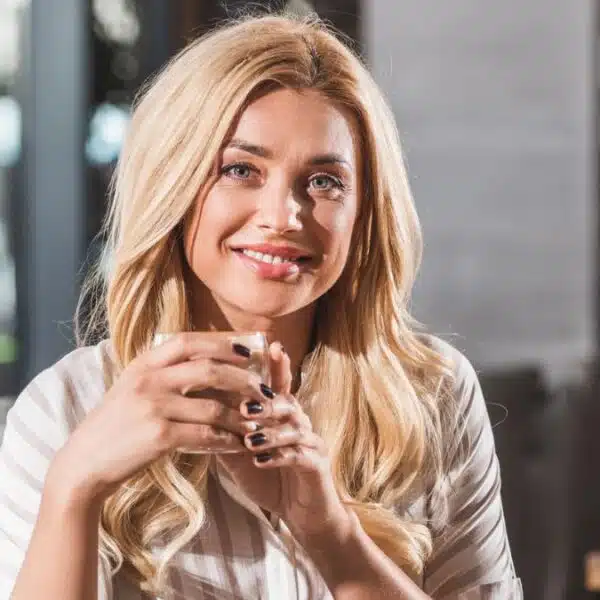 woman drinking coffee in a restaurant