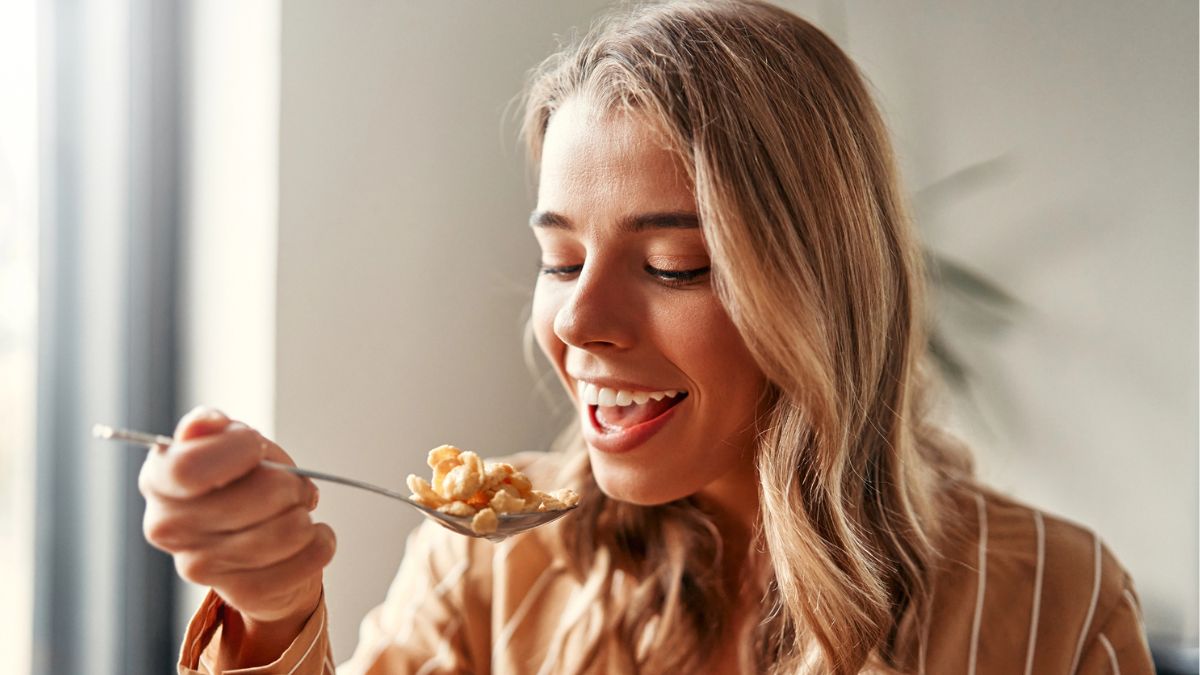 woman eating cereal