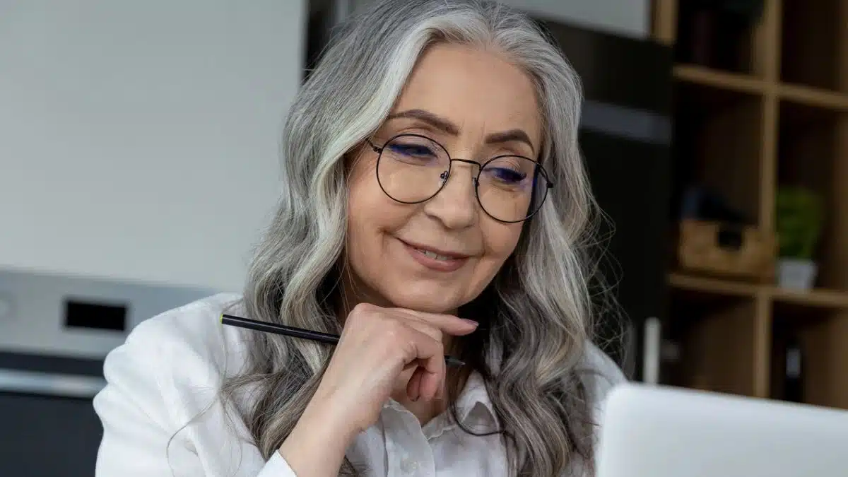 woman glasses reading a book