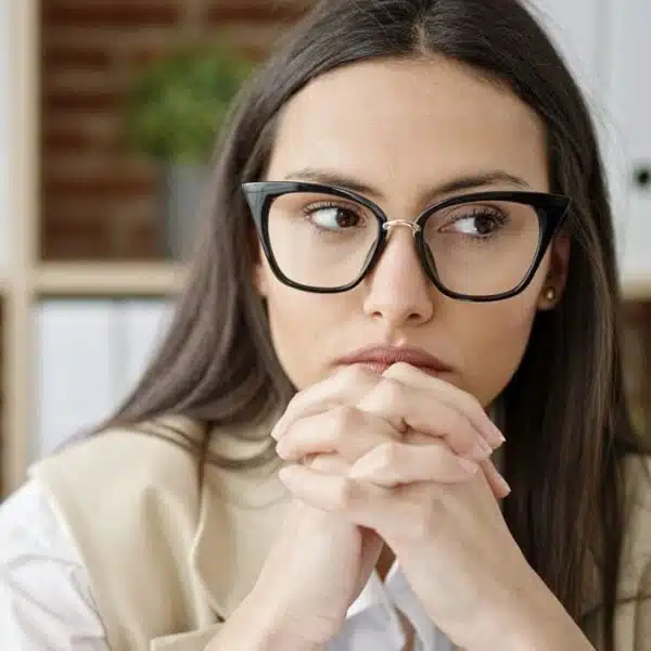 woman glasses thinking at work