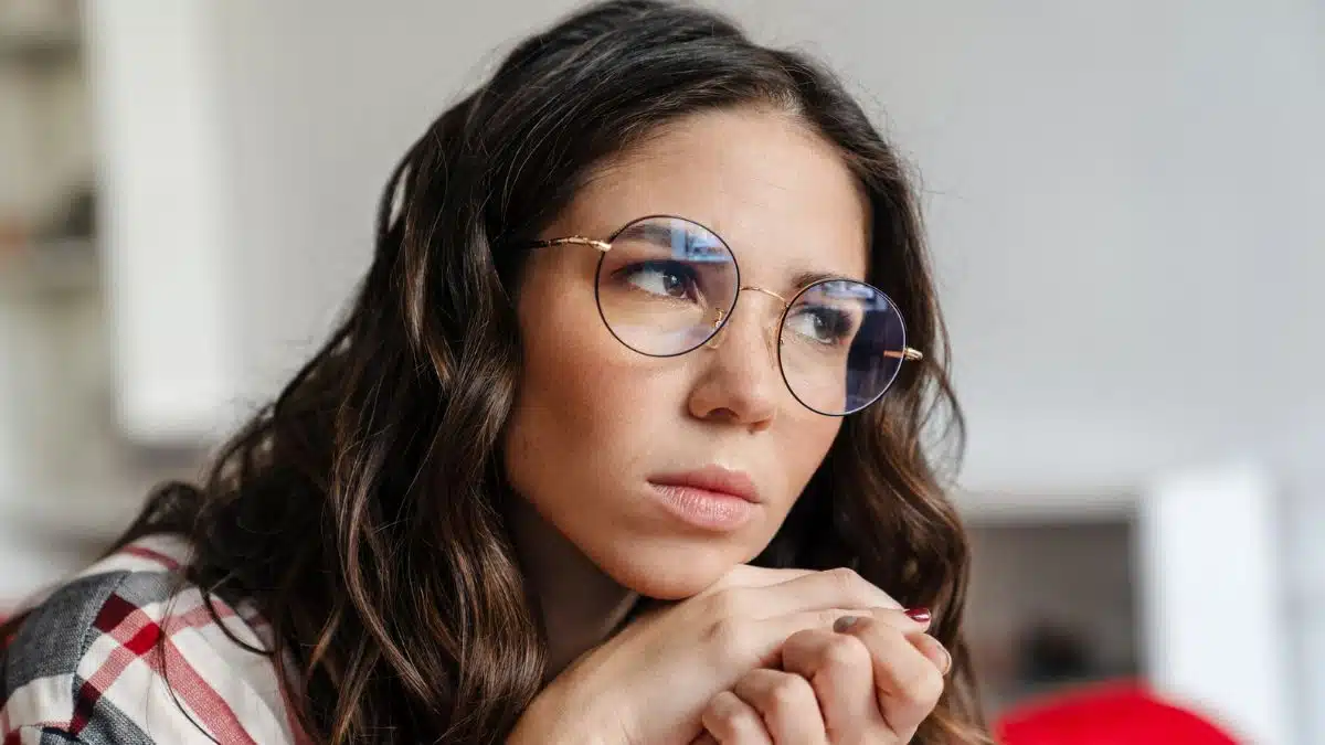 woman glasses thinking