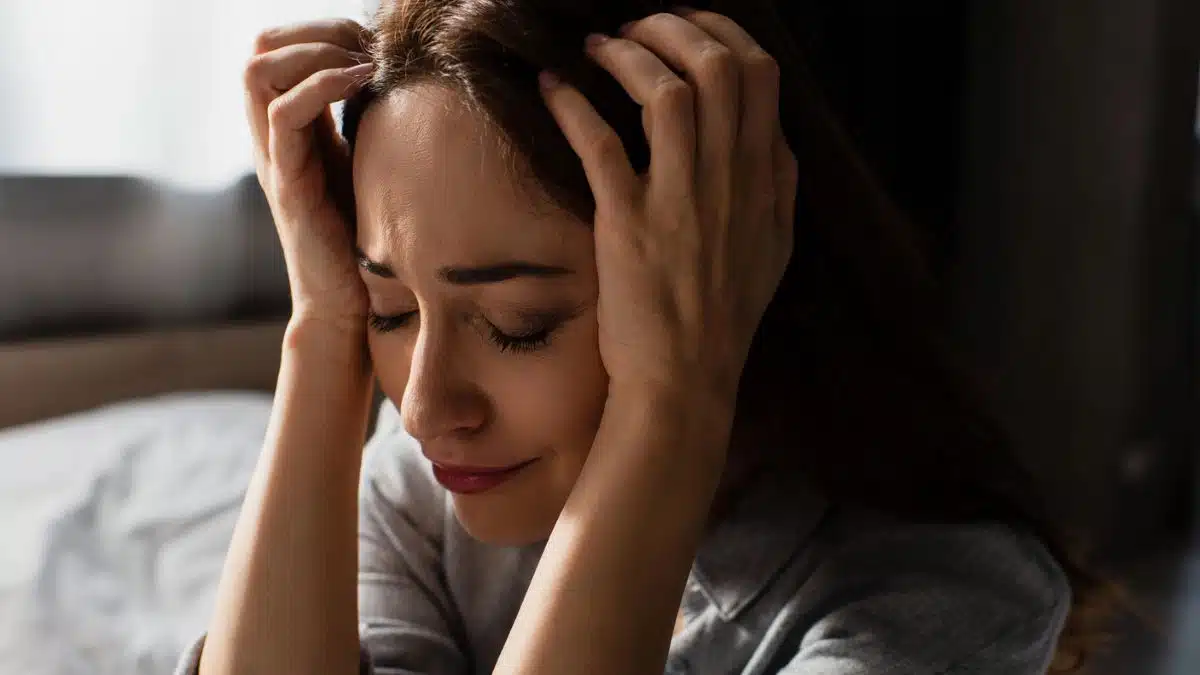 woman holding her about regret