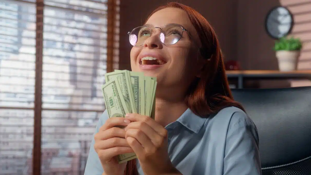 woman holding money