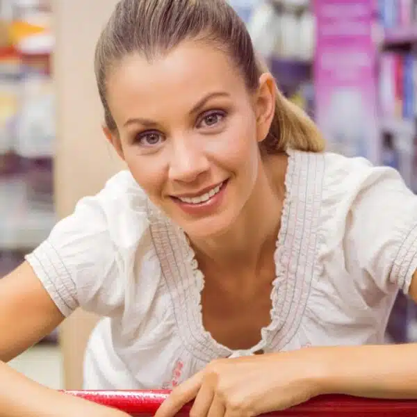 woman in grocery store leanings