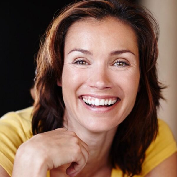 woman laughing with a big smile