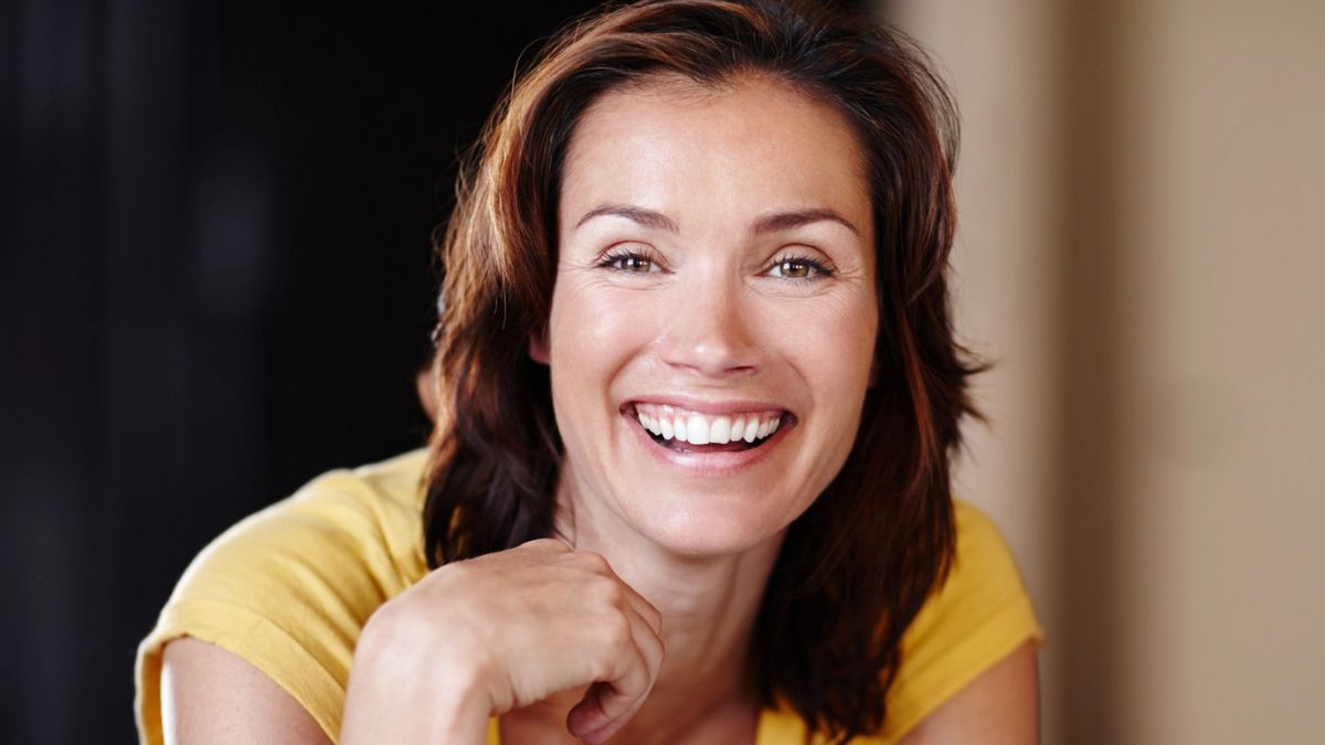 woman laughing with a big smile