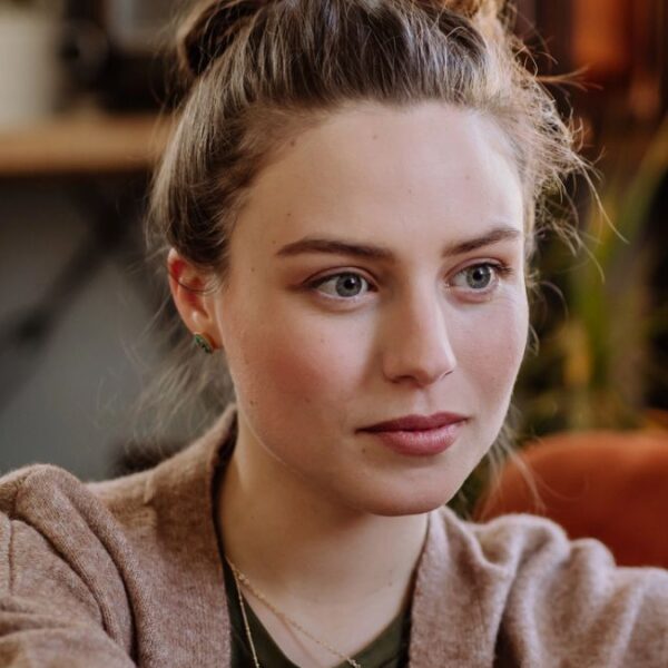 woman reading on her laptop