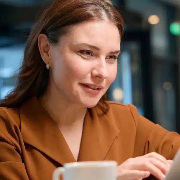 woman remote worker in the kitchen