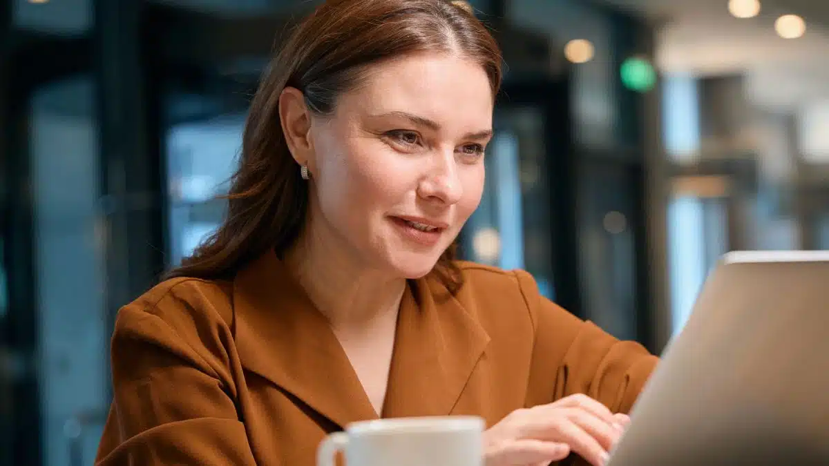 woman remote worker in the kitchen