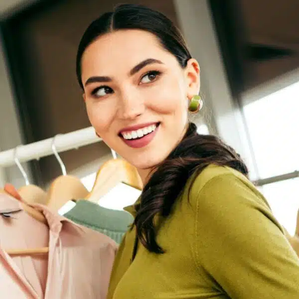 woman shopping at a store with clothes