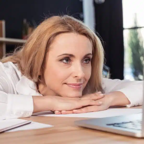 woman sitting at her laptop