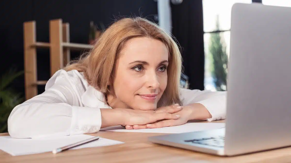 woman sitting at her laptop