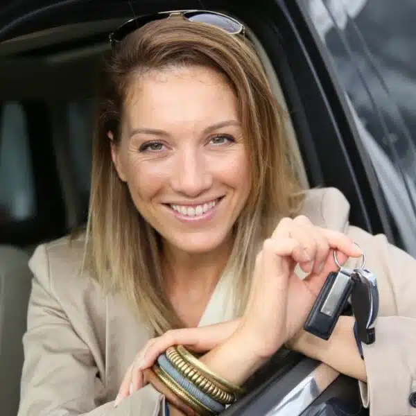 woman sitting in drivers seat