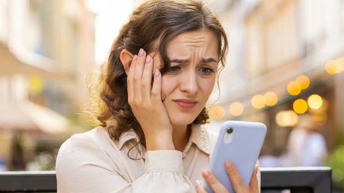 woman staring at her phone (1)