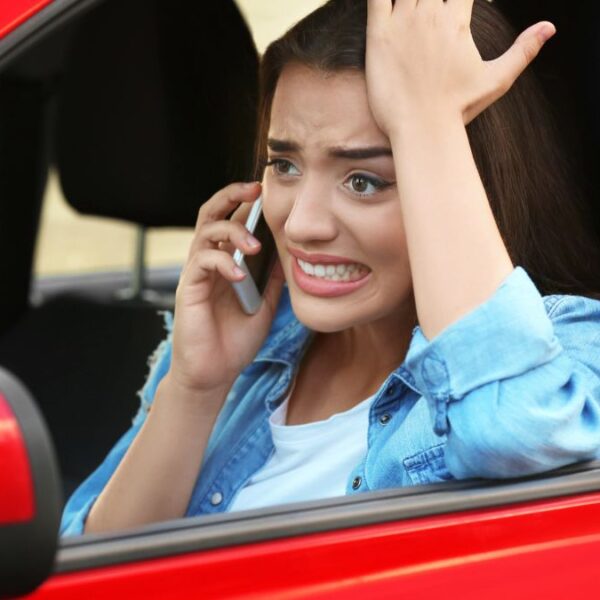woman stressed in her car