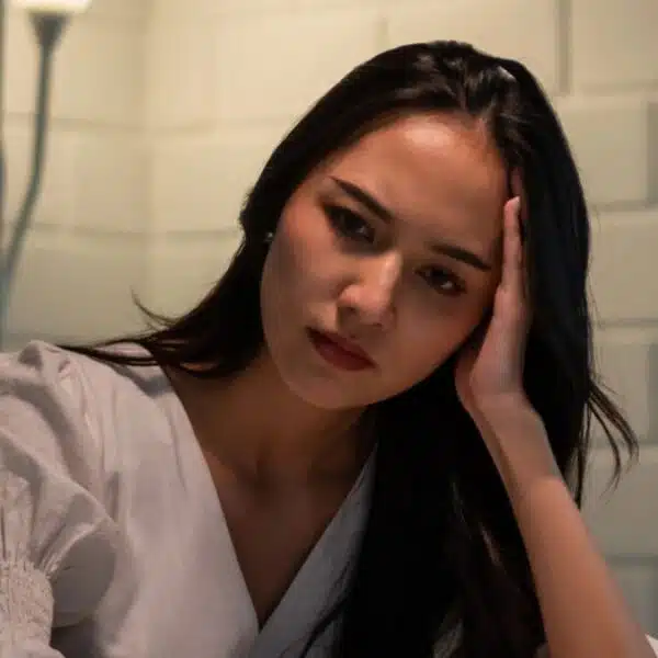 woman upset at table stress