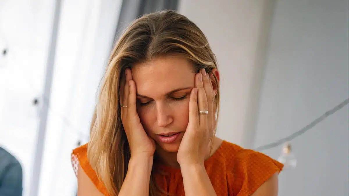 woman upset in her room