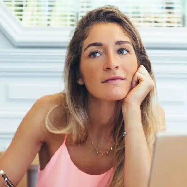 woman working from home thinking