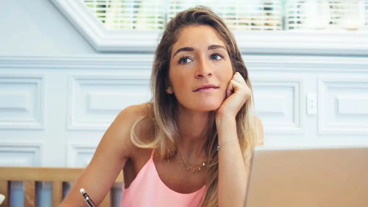 woman working from home thinking