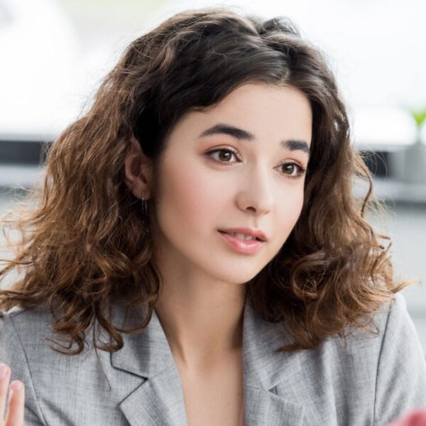 young woman office curly hair
