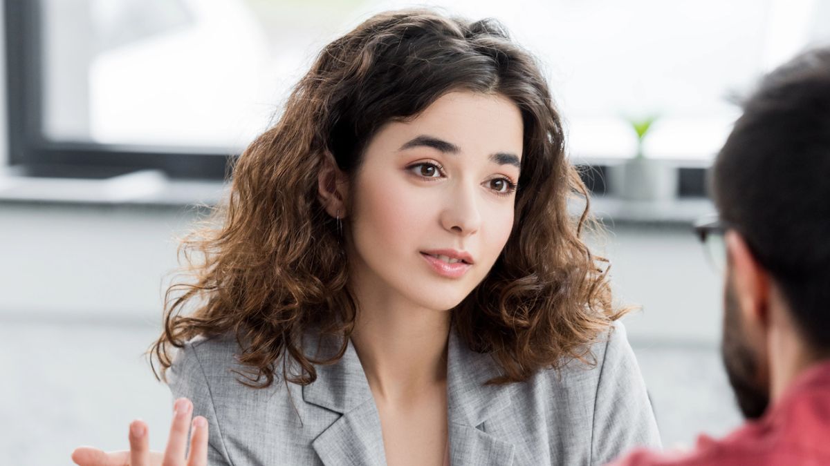 young woman office curly hair