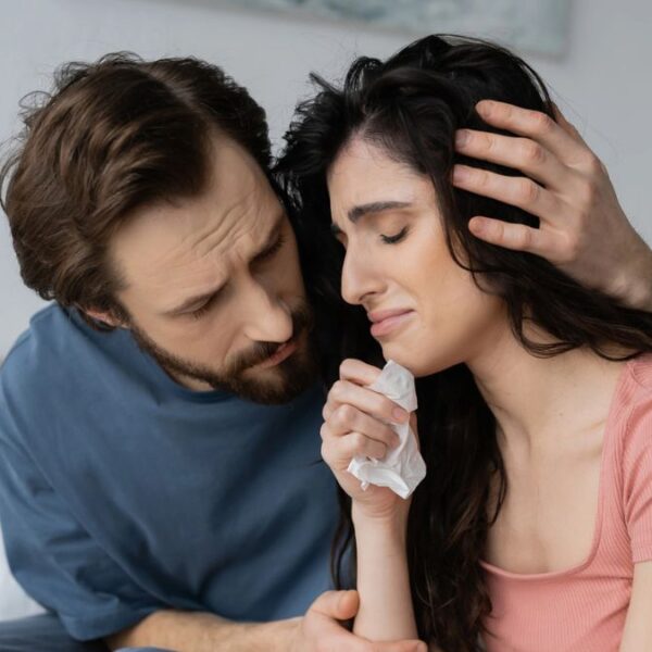 couple crying in pajamas