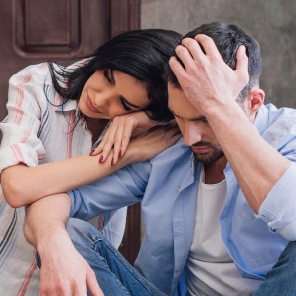 couple sitting on the floor