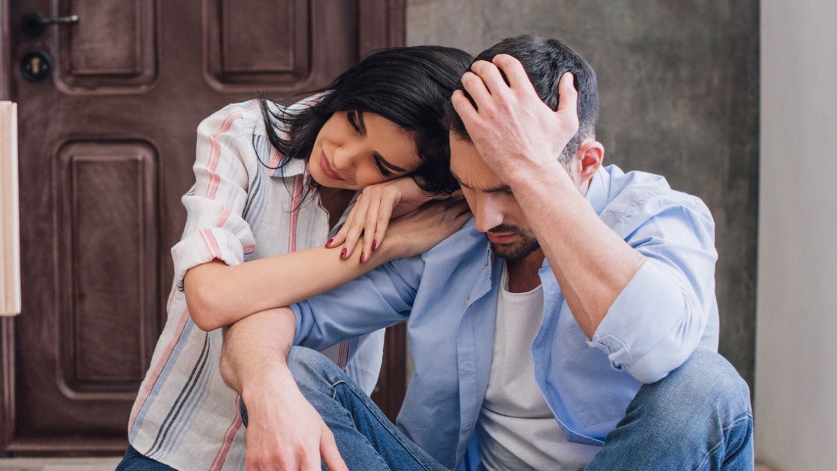 couple sitting on the floor