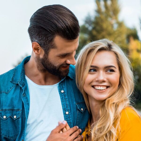 couple smiling on the beach (2)