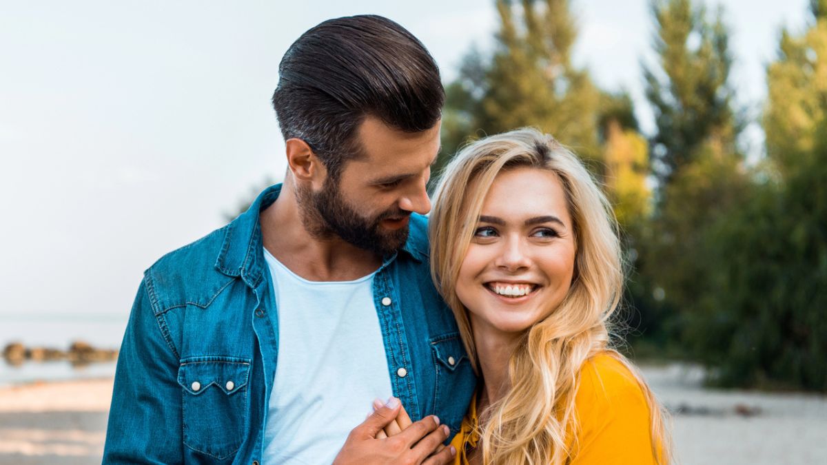 couple smiling on the beach (2)