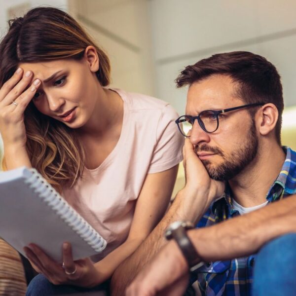 couple stressing at the budget