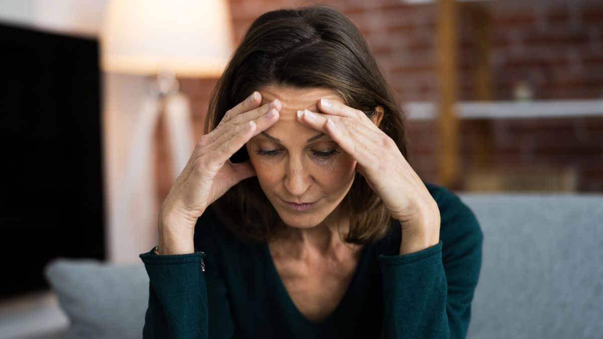 woman at home stressed