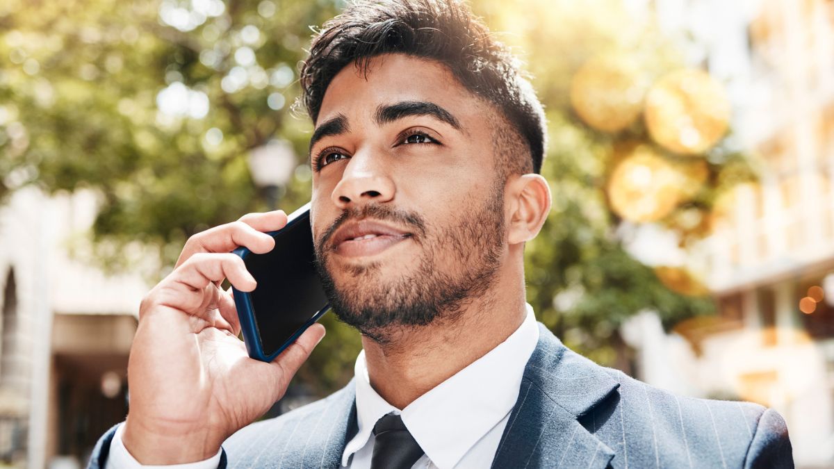 man on the phone young suit