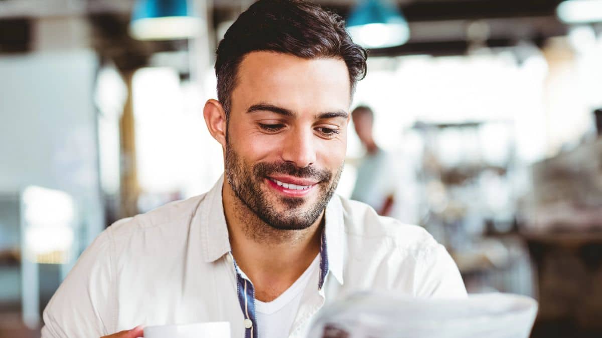 man reading a newspaper