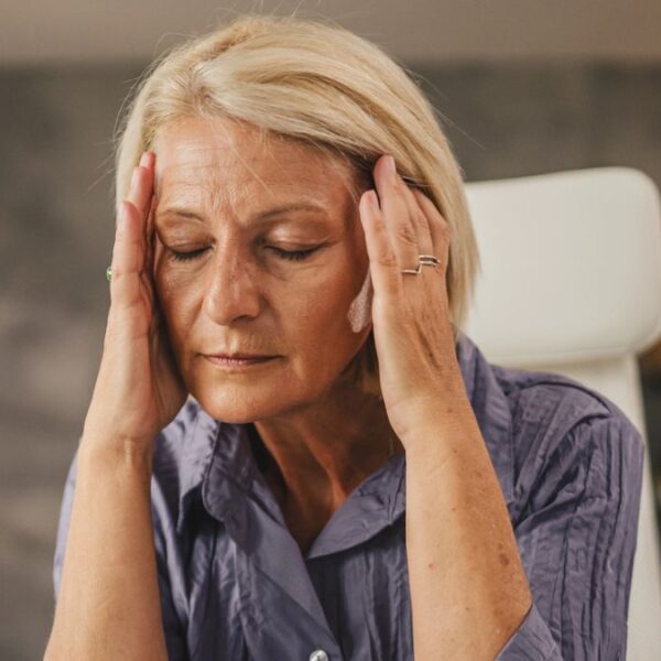 mature woman with a headache