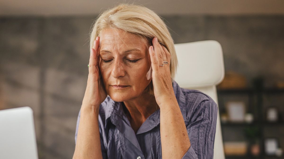mature woman with a headache