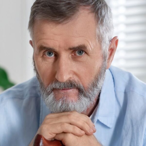 older man with a cane