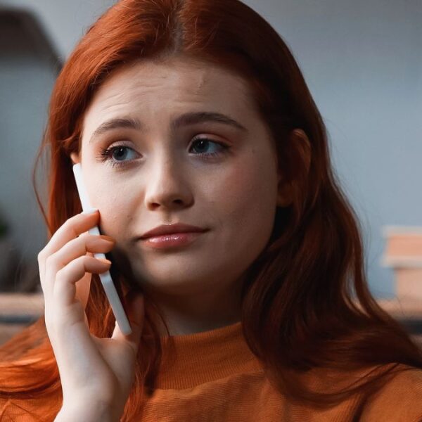 redhead on the phone call