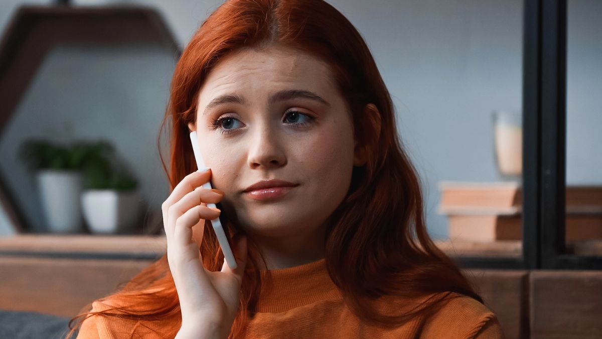 redhead on the phone call