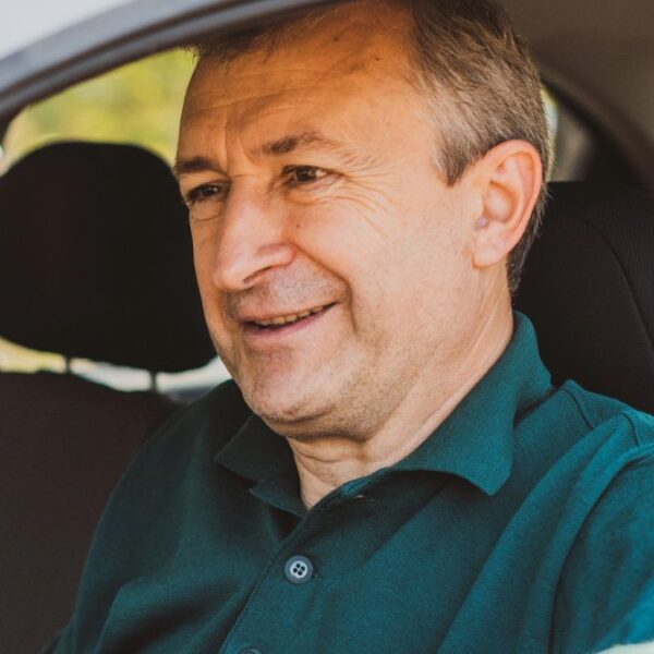 senior man driving a car