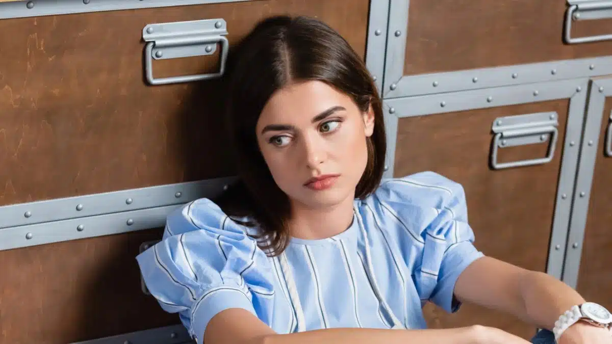 woman bored on her kitchen floor