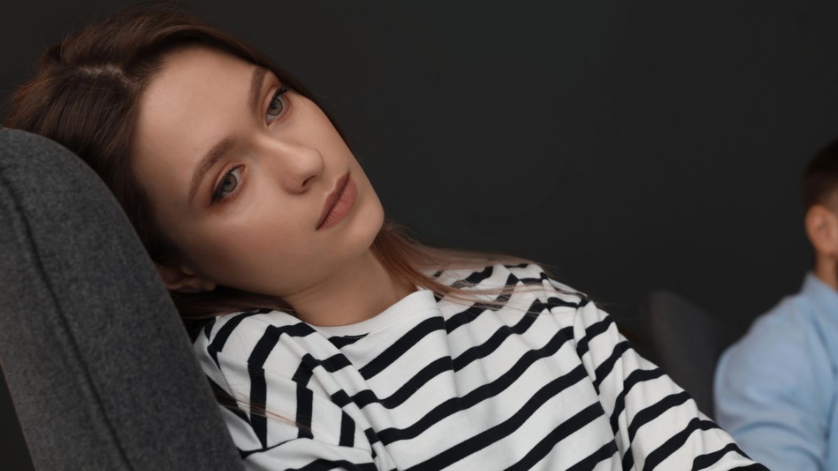 woman bored on the couch