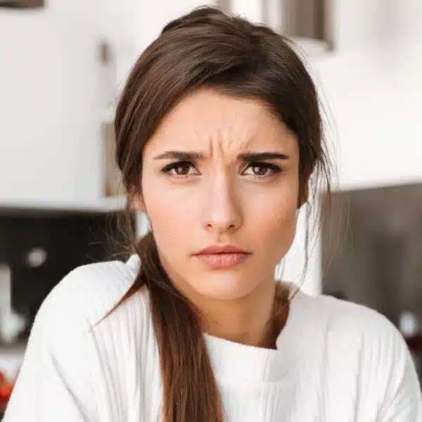 woman confused sitting with spouse