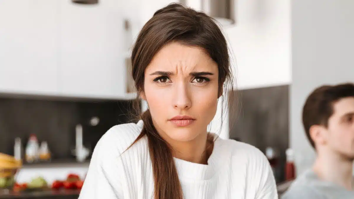 woman confused sitting with spouse