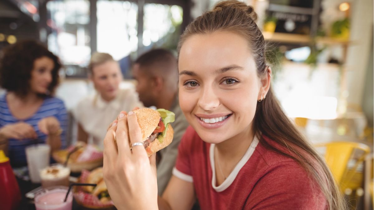 woman eating a burger